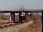 NS 7004 leads a train southbound